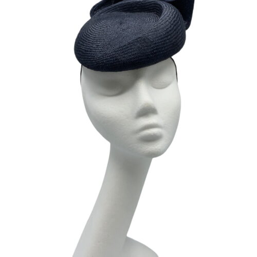 Stunning navy structured headpiece with bow detail to the back.